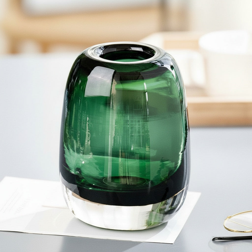 Emerald green glass vase with heavy clear base front view
