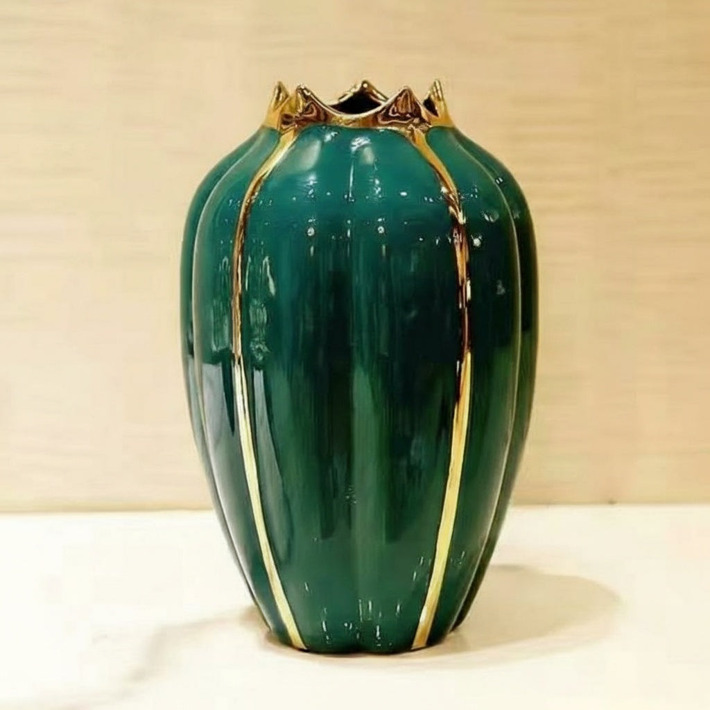 Large emerald green vase with gold vertical stripes and wavy rim