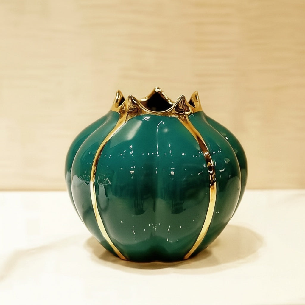 Medium round emerald green ceramic vase with gold accents