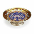 High angle view of enamel and brass footed bowl with lotus pattern
