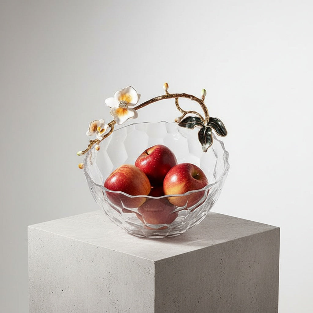 Overhead view of glass fruit bowl with enamel flower handle