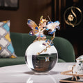 Enameled fairy figure on crystal sphere base front view
