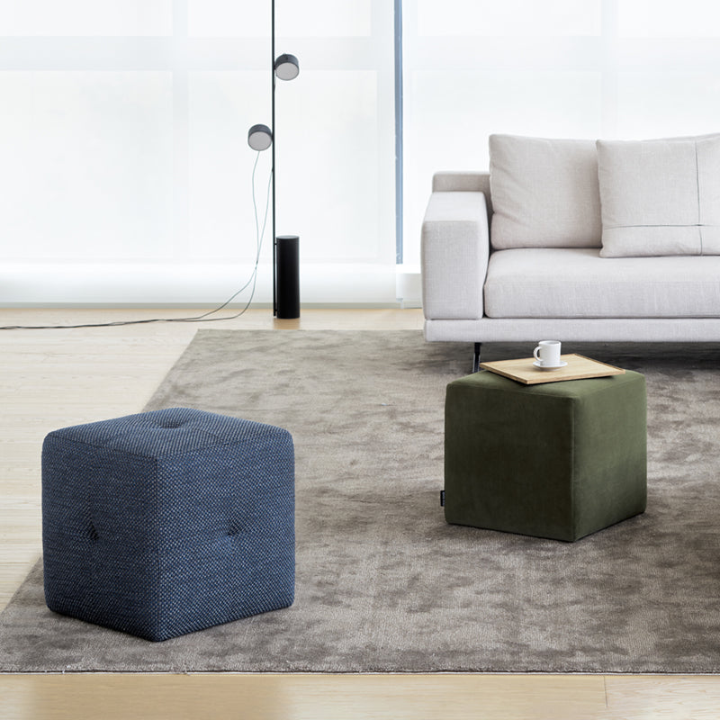 Fabric cube ottoman group shot in modern living room