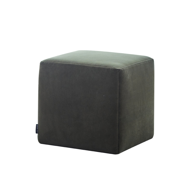 Dark green velvet cube ottoman isolated view
