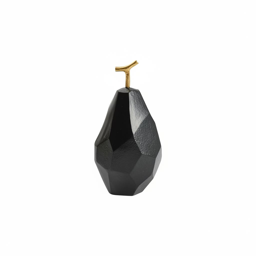 Modern black faceted pear sculpture isolated