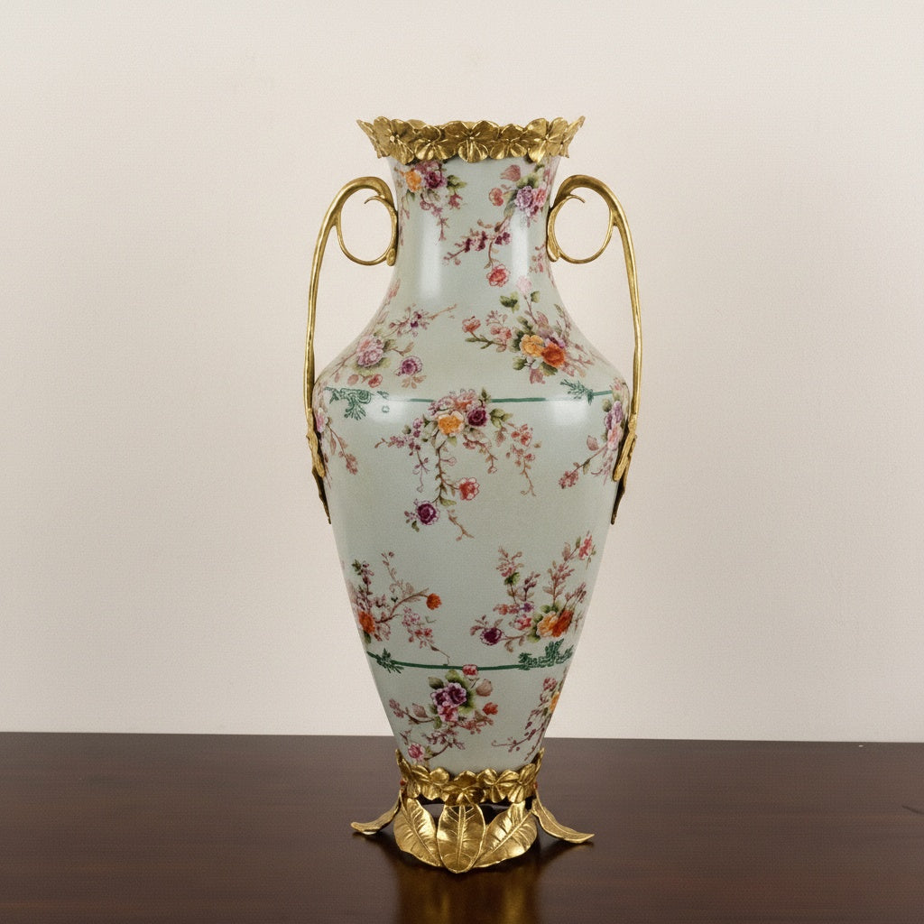 Floral ceramic vase with brass finish handles and base front view
