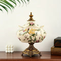 Floral Ceramic And Brass Finish Lidded Decorative Jar