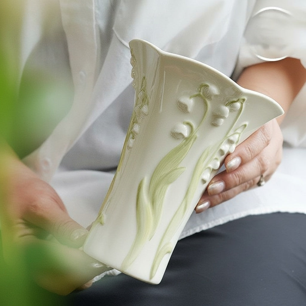 Floral Embossed Ceramic Flared Vase Held