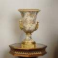 Angled view of decorative porcelain vase on pedestal base