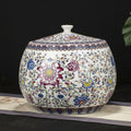 Front view of floral patterned porcelain lidded jar on table runner