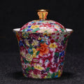 Floral Porcelain And Gold Lidded Teacup