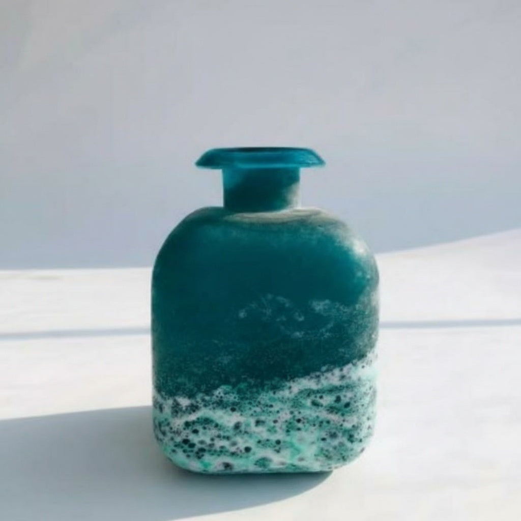 Front view of frosted teal vase with sea foam texture