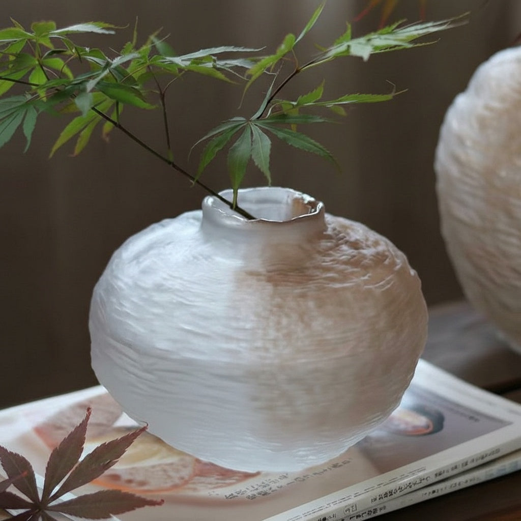 Textured frosted glass round vase with botanical stem