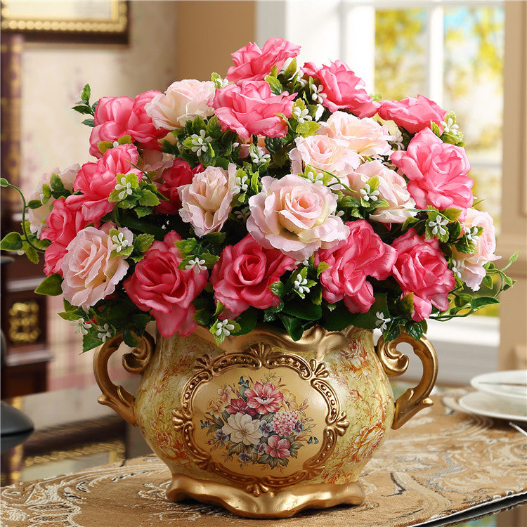 Antique style ceramic vase with pink artificial roses