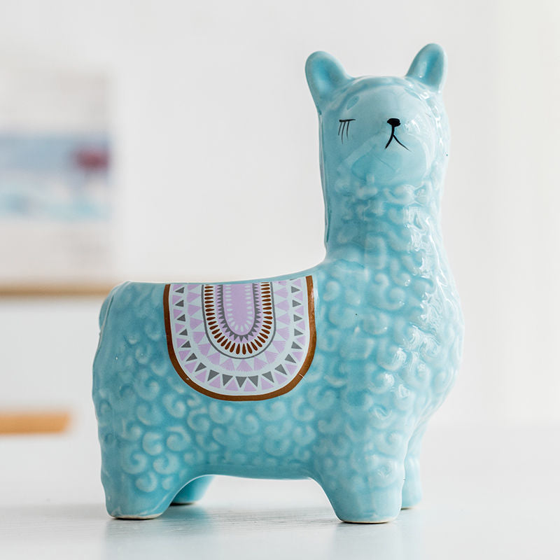 Sky blue ceramic alpaca planter side view