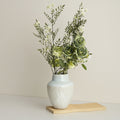 Glazed Ceramic Ribbed Vase with floral arrangement