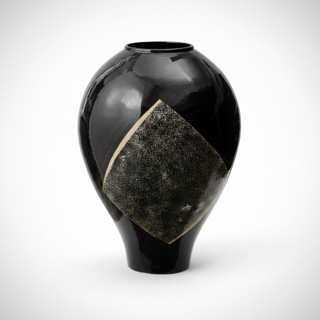 Gloss black ceramic vase with textured geometric accent side view
