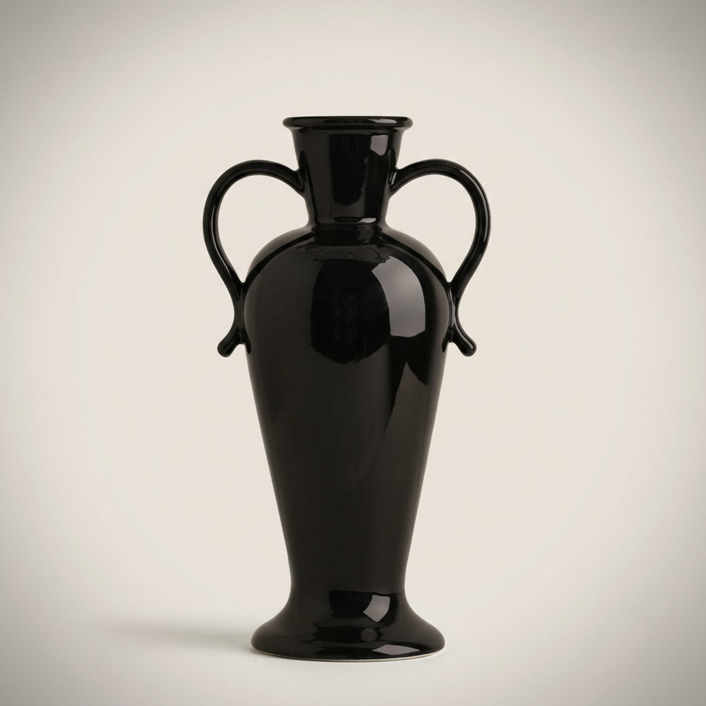 Studio view of glossy black dual-handle ceramic vase