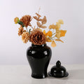 Glossy Black Ceramic Temple Jar styled with floral arrangement