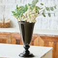 Glossy black ceramic trumpet vase with floral arrangement
