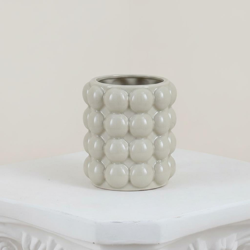 Medium glossy grey ceramic vase with bubble texture front view