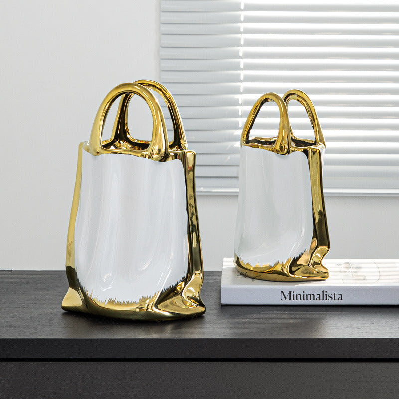 Large and medium ceramic bag vases styled together