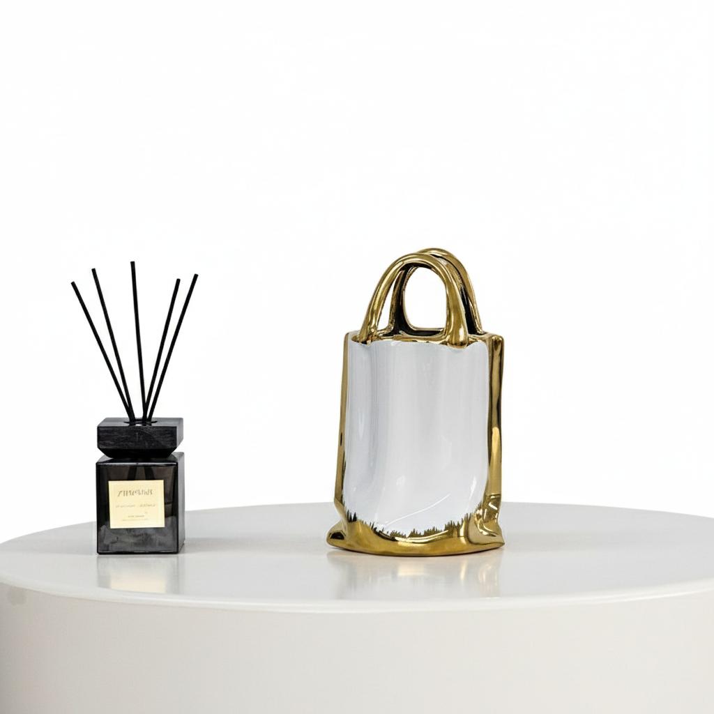 Medium ceramic bag vase isolated on white