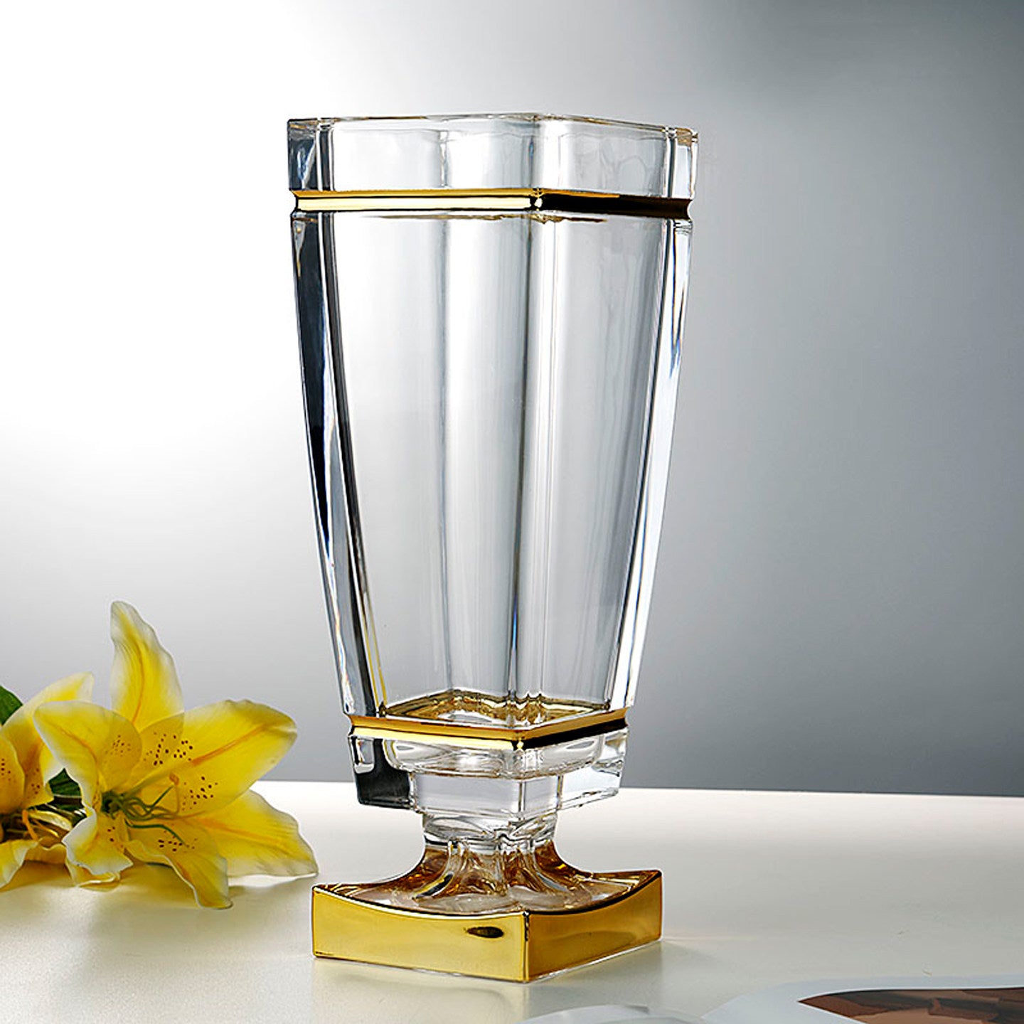 Lifestyle view of vase with yellow lilies