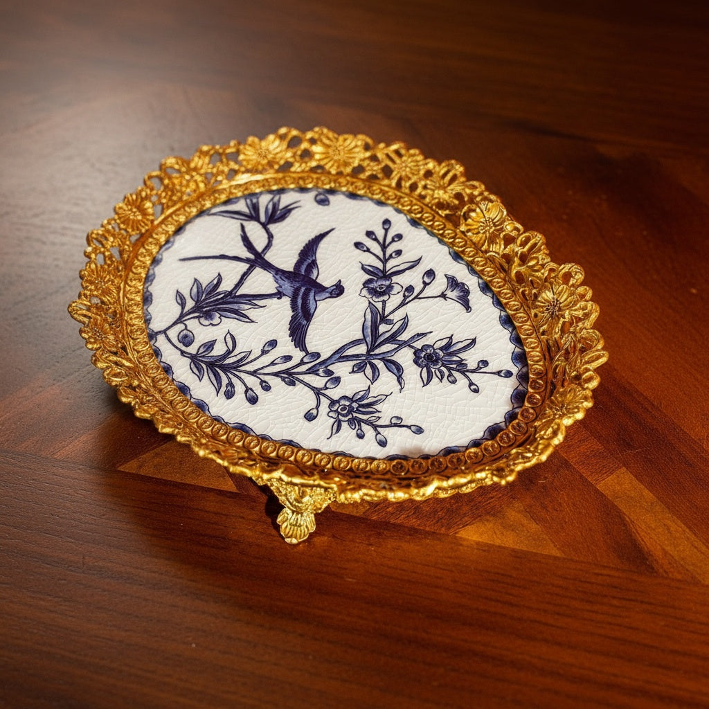 Close up detail of crackle glaze and blue bird motif on tray