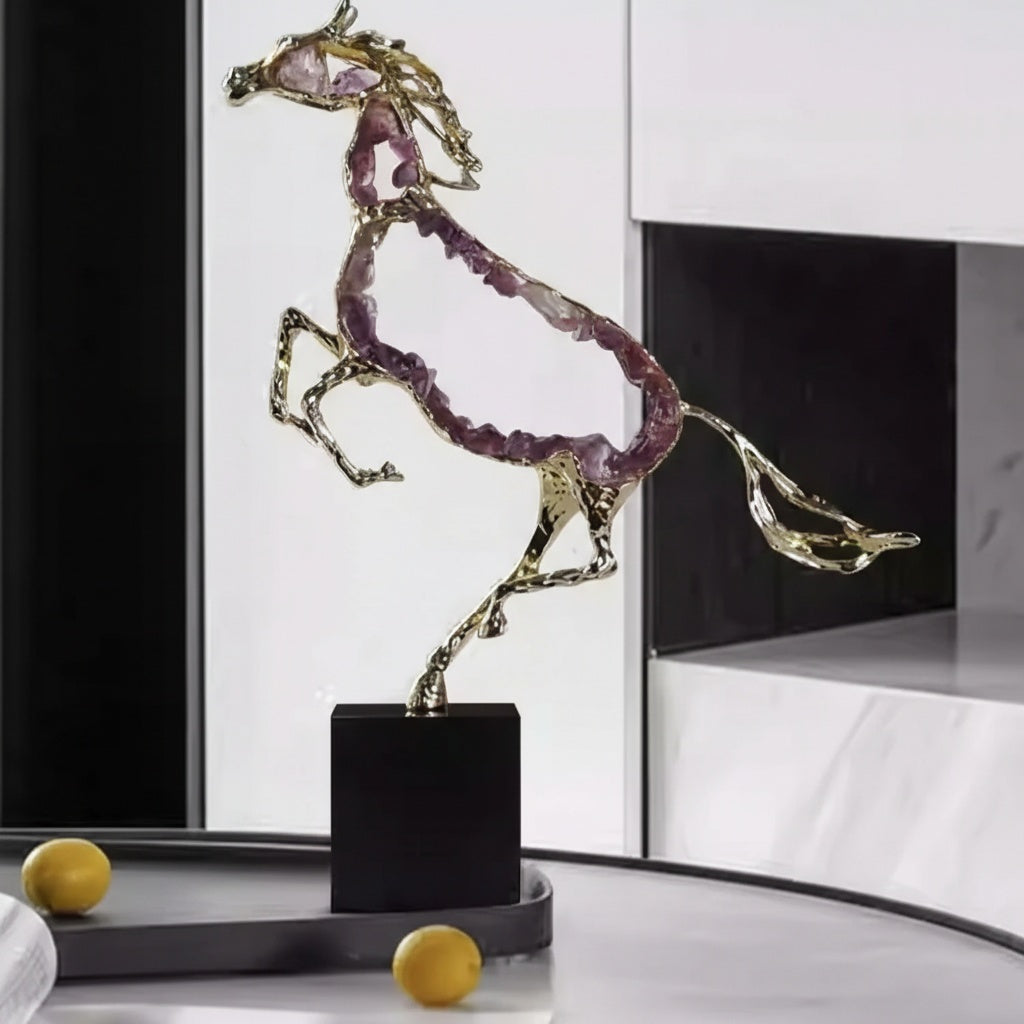 Gold-finish metal and amethyst crystal rearing horse sculpture on black base