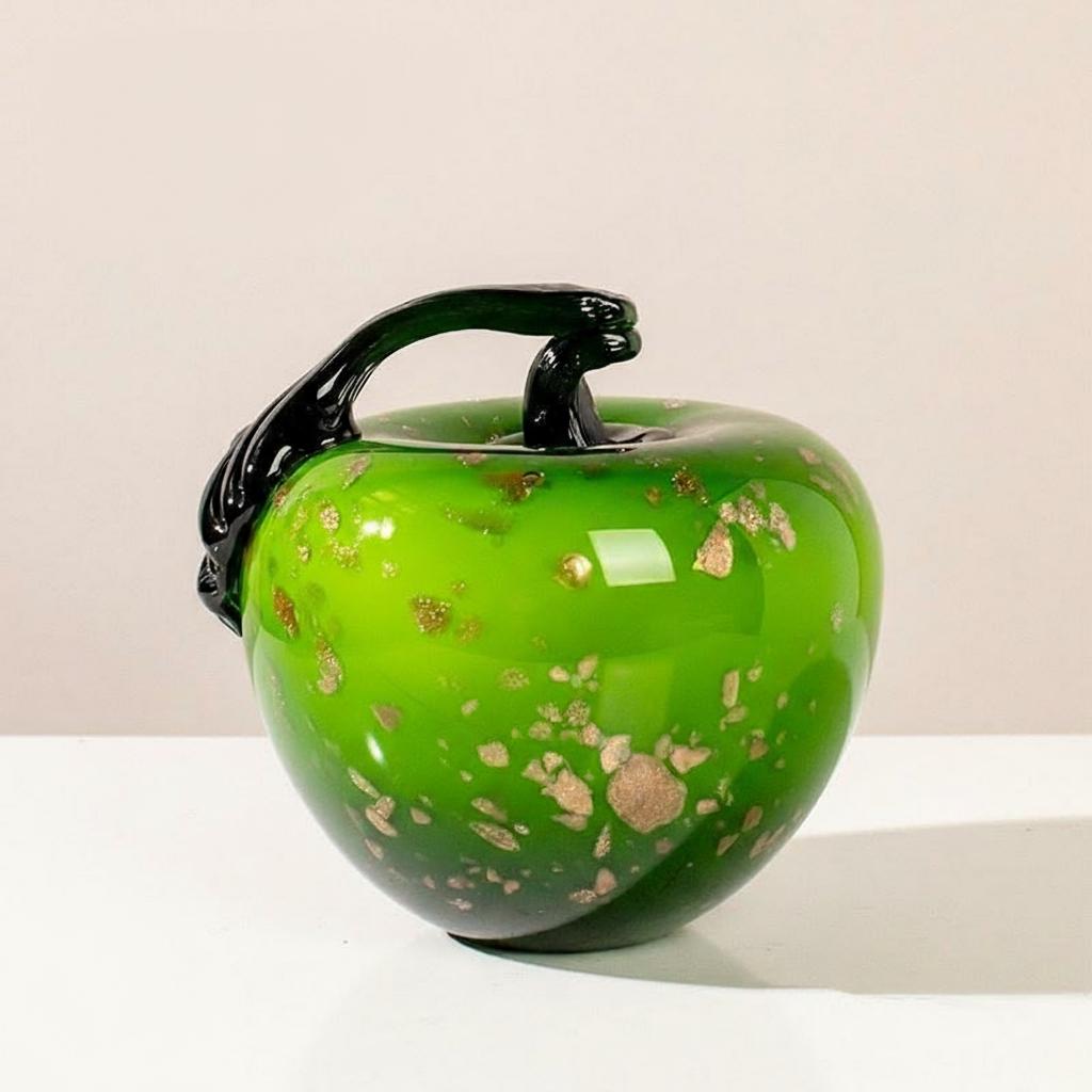 Green art glass apple with gold flecks detail