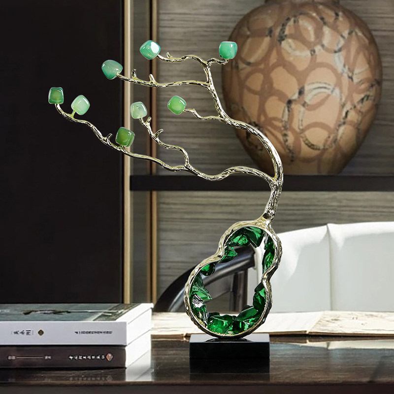 Detailed view of crystal tree sculpture against dark background