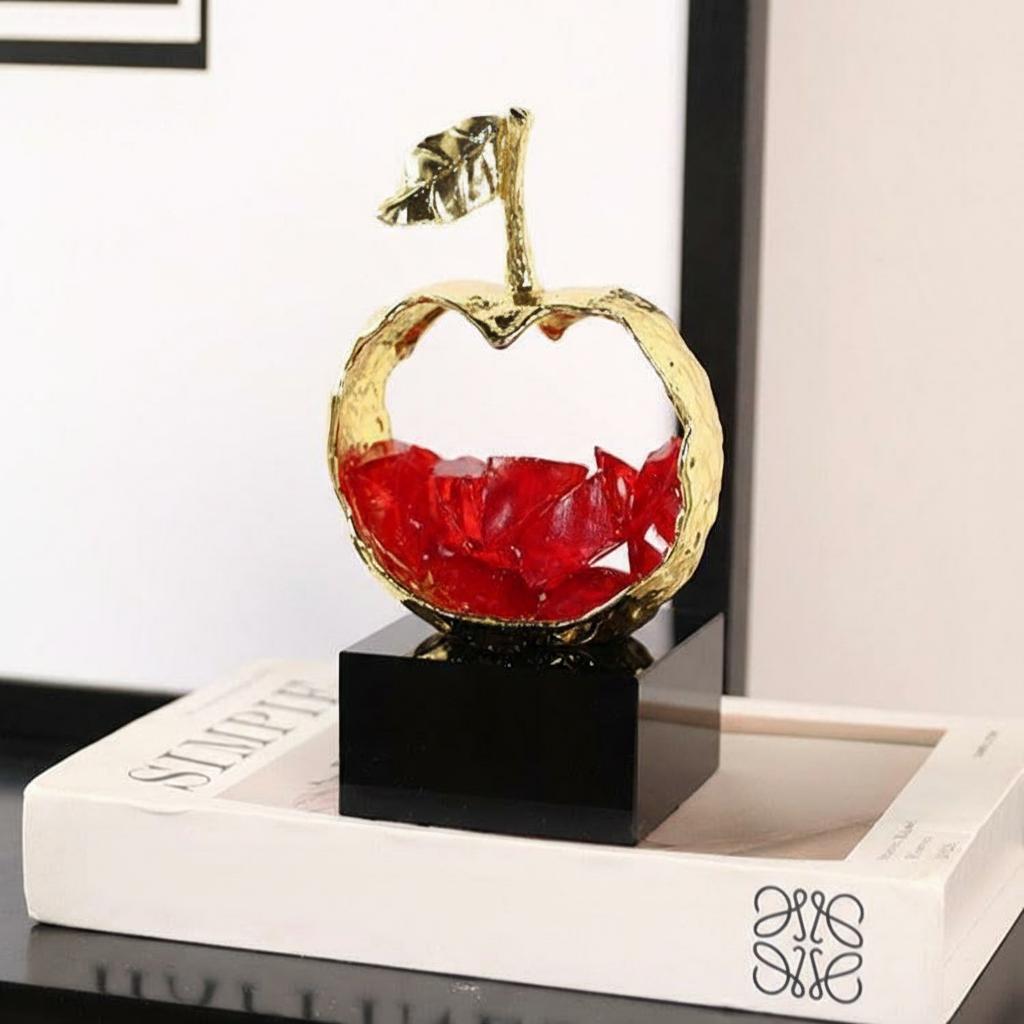 Detail view of red crystal shards inside gold frame