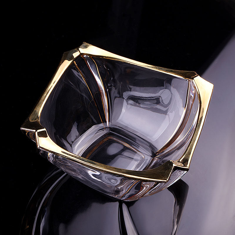 Open square glass bowl with gold trim top view