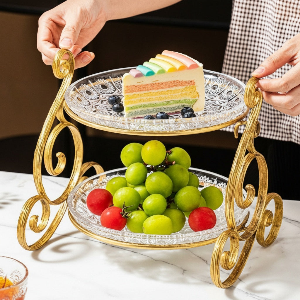 Hands adjusting glass tier on gold stand