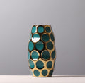 Large gold and teal geometric vase front view