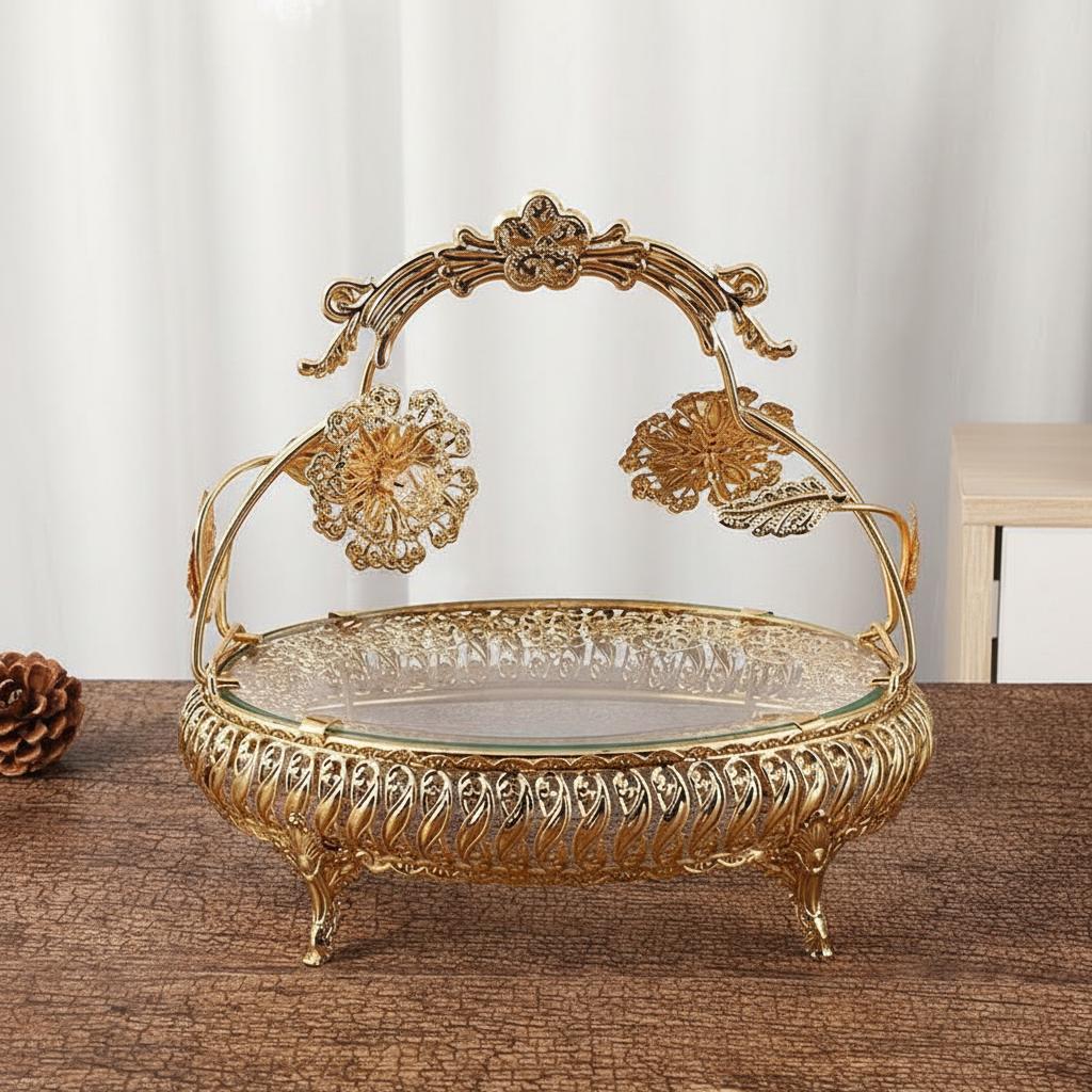 Angled view of gold metal and glass serving basket