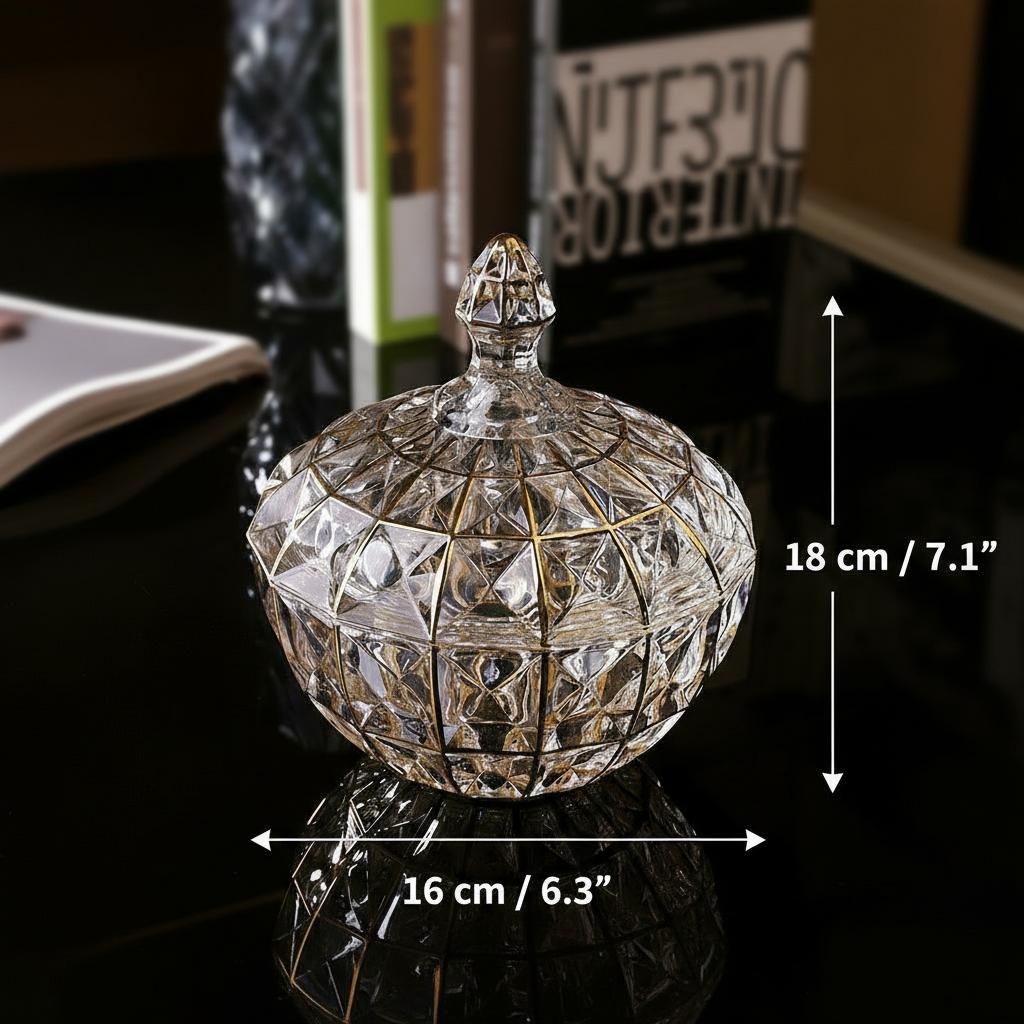 Lifestyle view of faceted glass jar on reflective surface with books