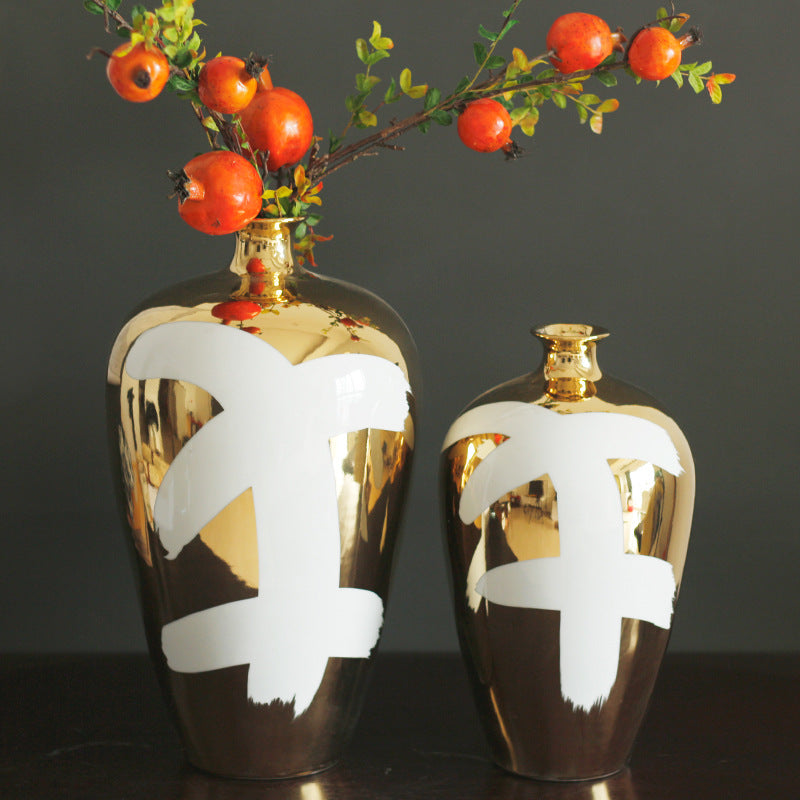 Two gold and white abstract vases with pomegranate branches