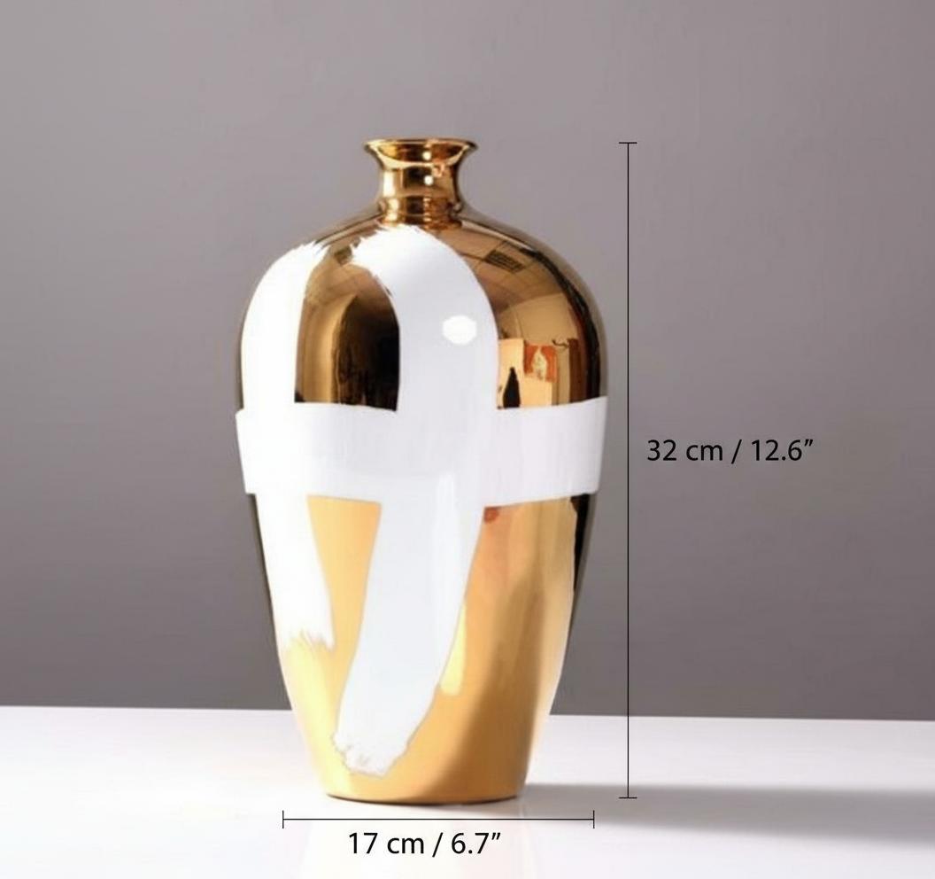 Side view of gold and white luxury vase