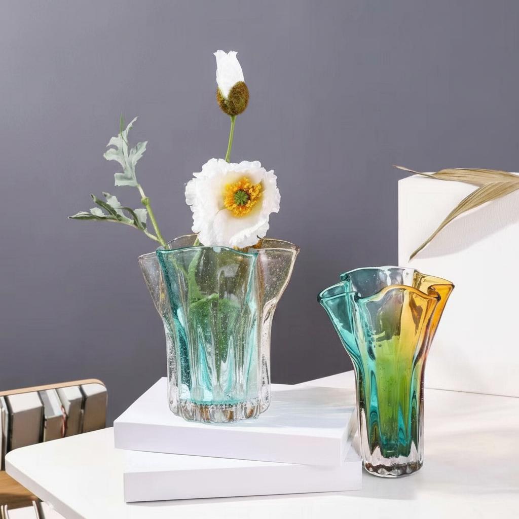 Group shot of teal and amber art glass vases