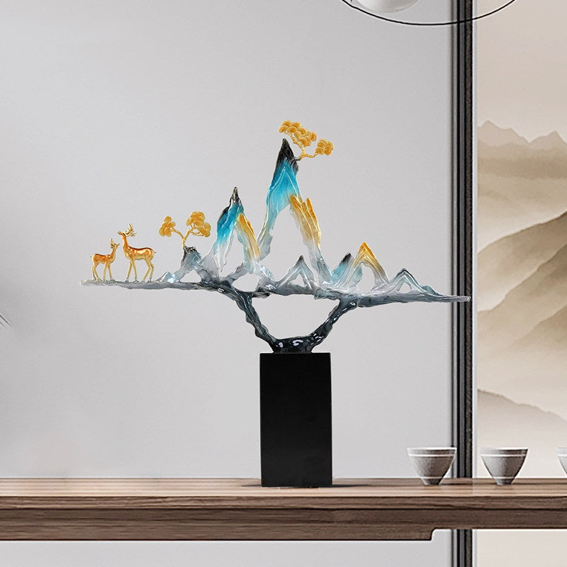 Side angle detail of resin mountain peaks and black base