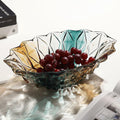 Gradient crystal glass bowl with grapes on white table