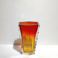 Red faceted hexagonal glass vase