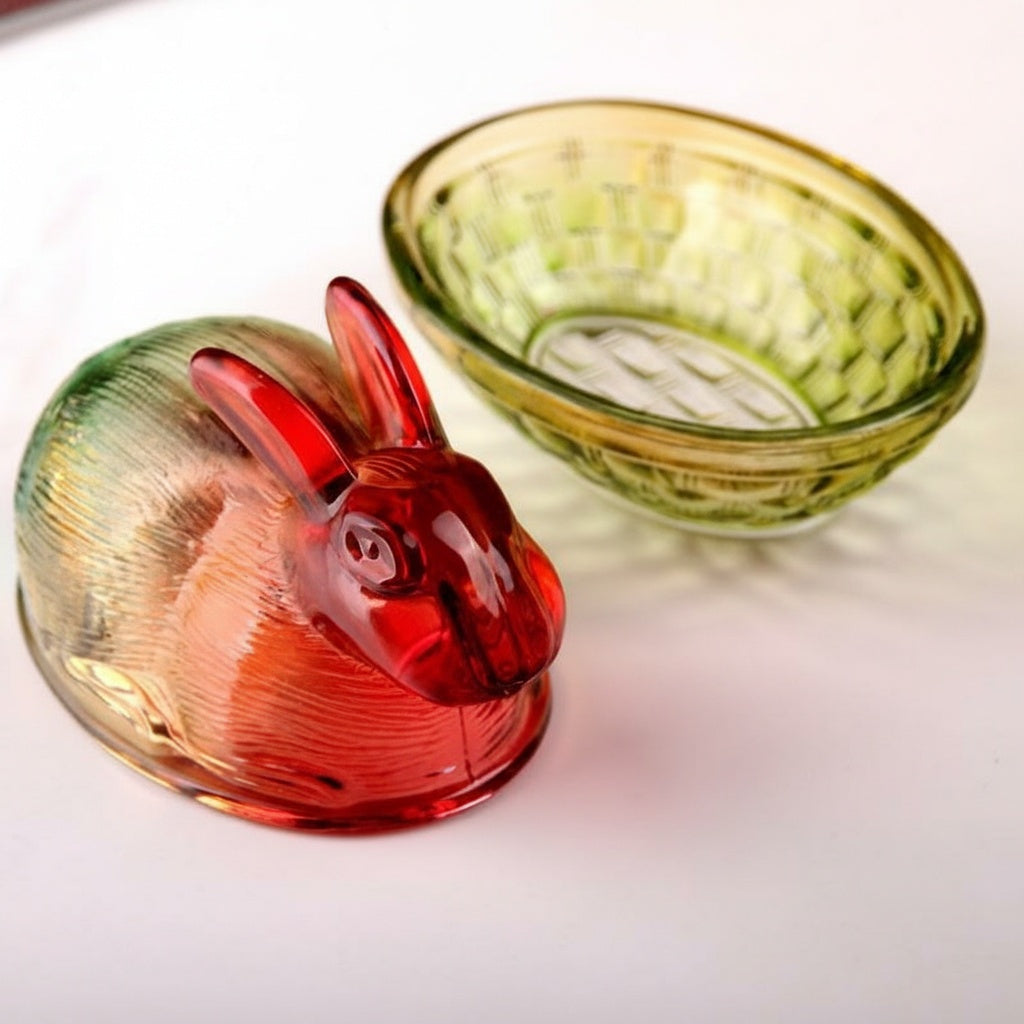 Open view of glass rabbit lid next to basket base