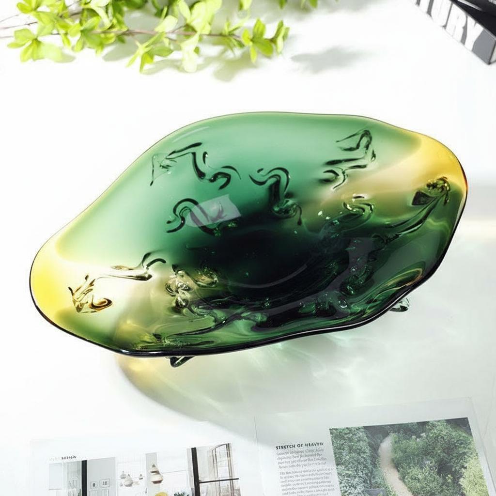 Top down view of empty emerald and amber bowl