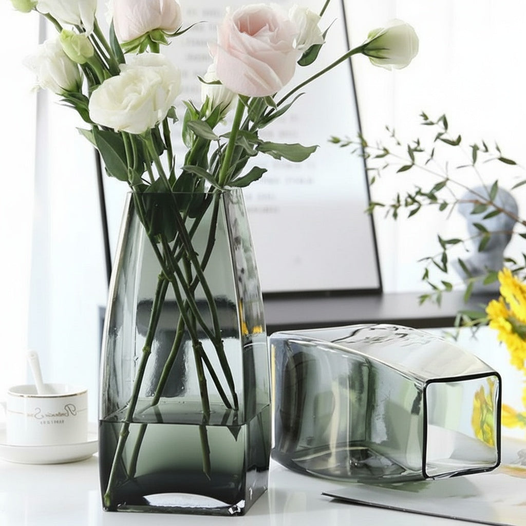 Graphite glass geometric vase styled with pink and white flowers