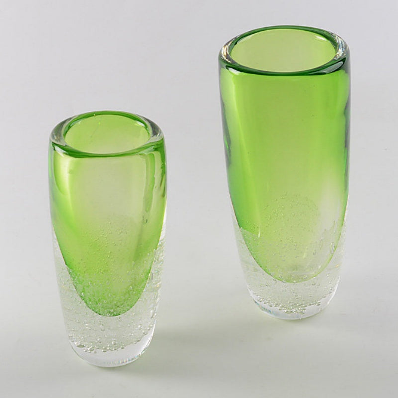 Set of two green art glass vases high angle