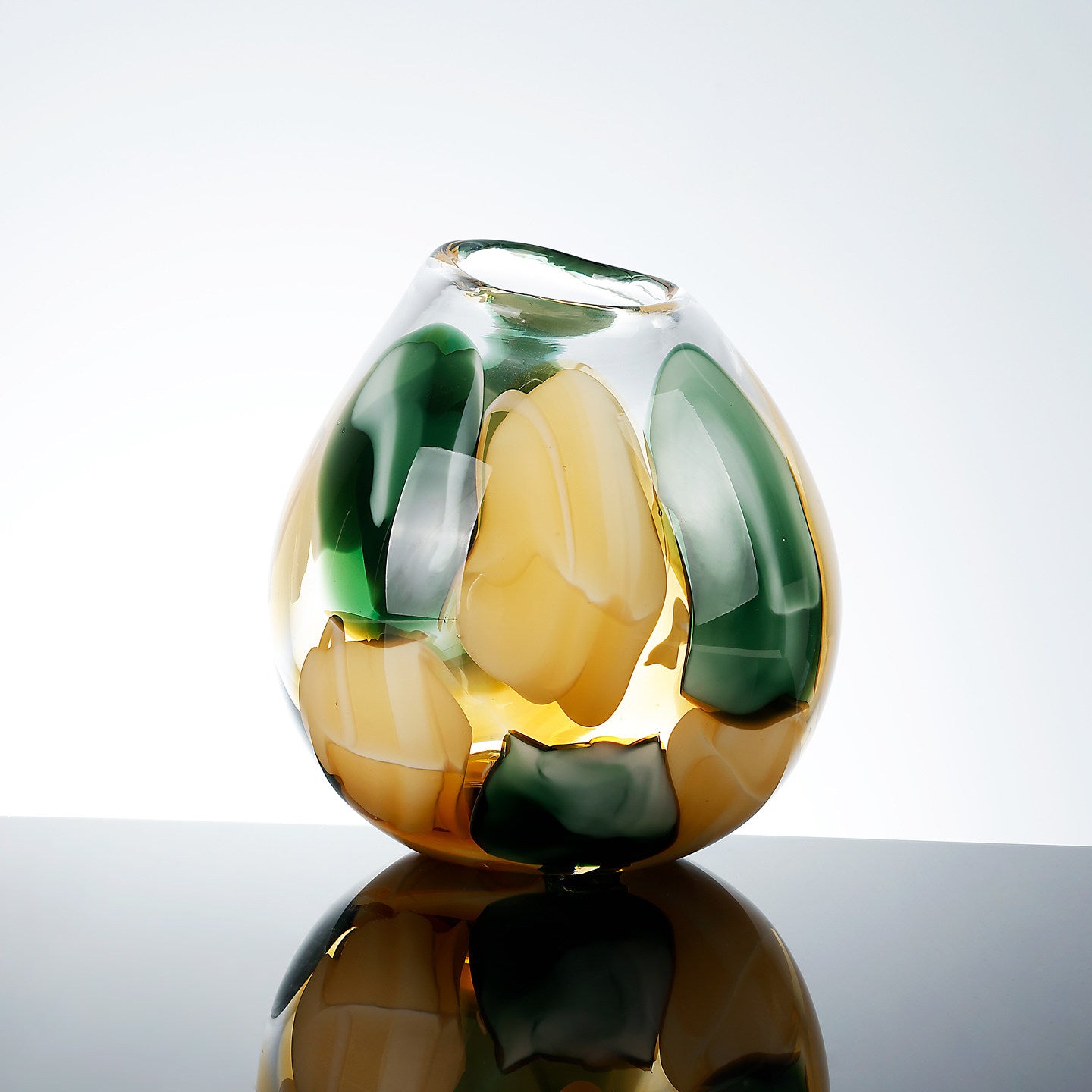 Front view of medium art glass vase with organic petal design