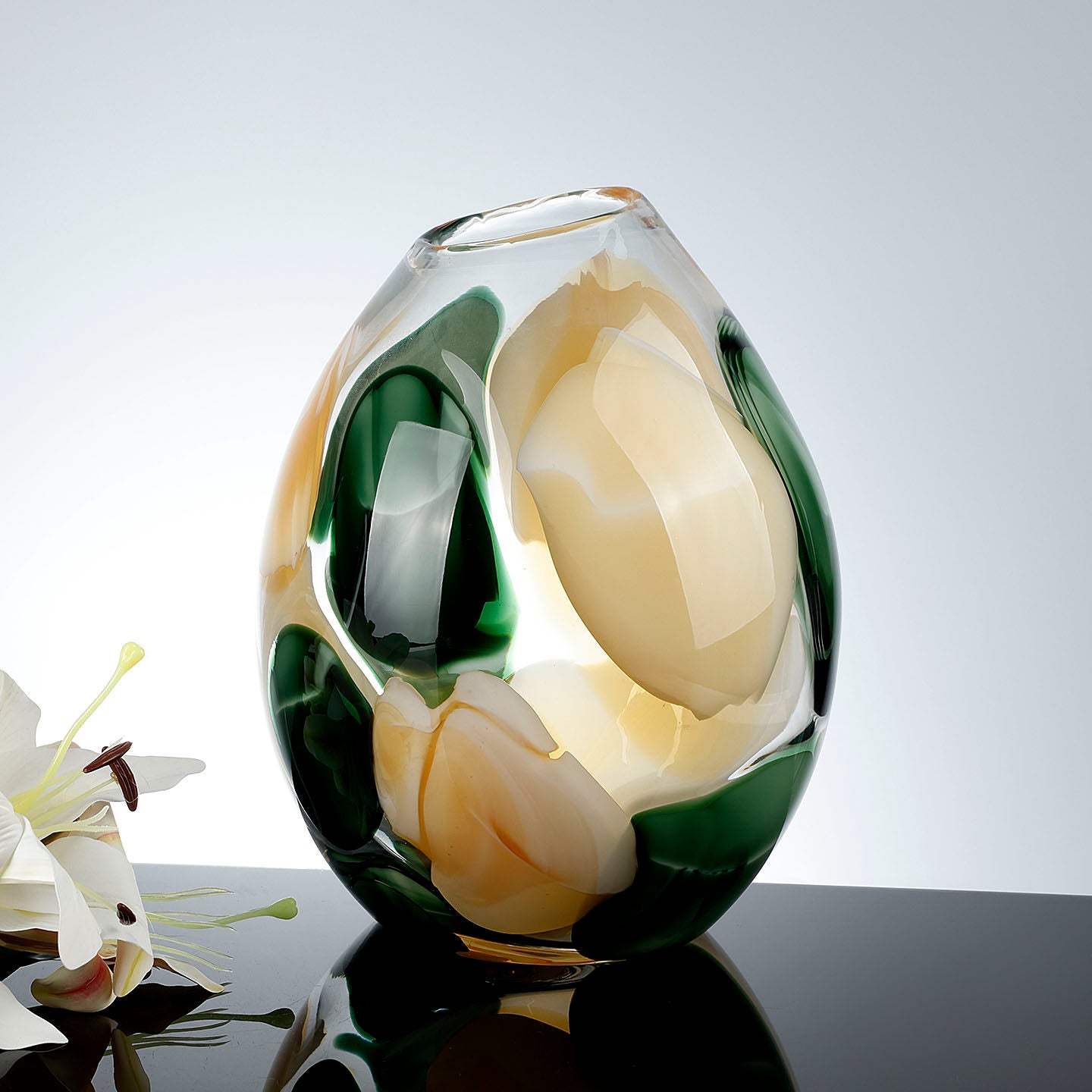 Front view of large art glass vase with thick clear casing
